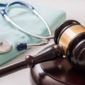 What are the 4 things that must be proven to win a medical malpractice suit?